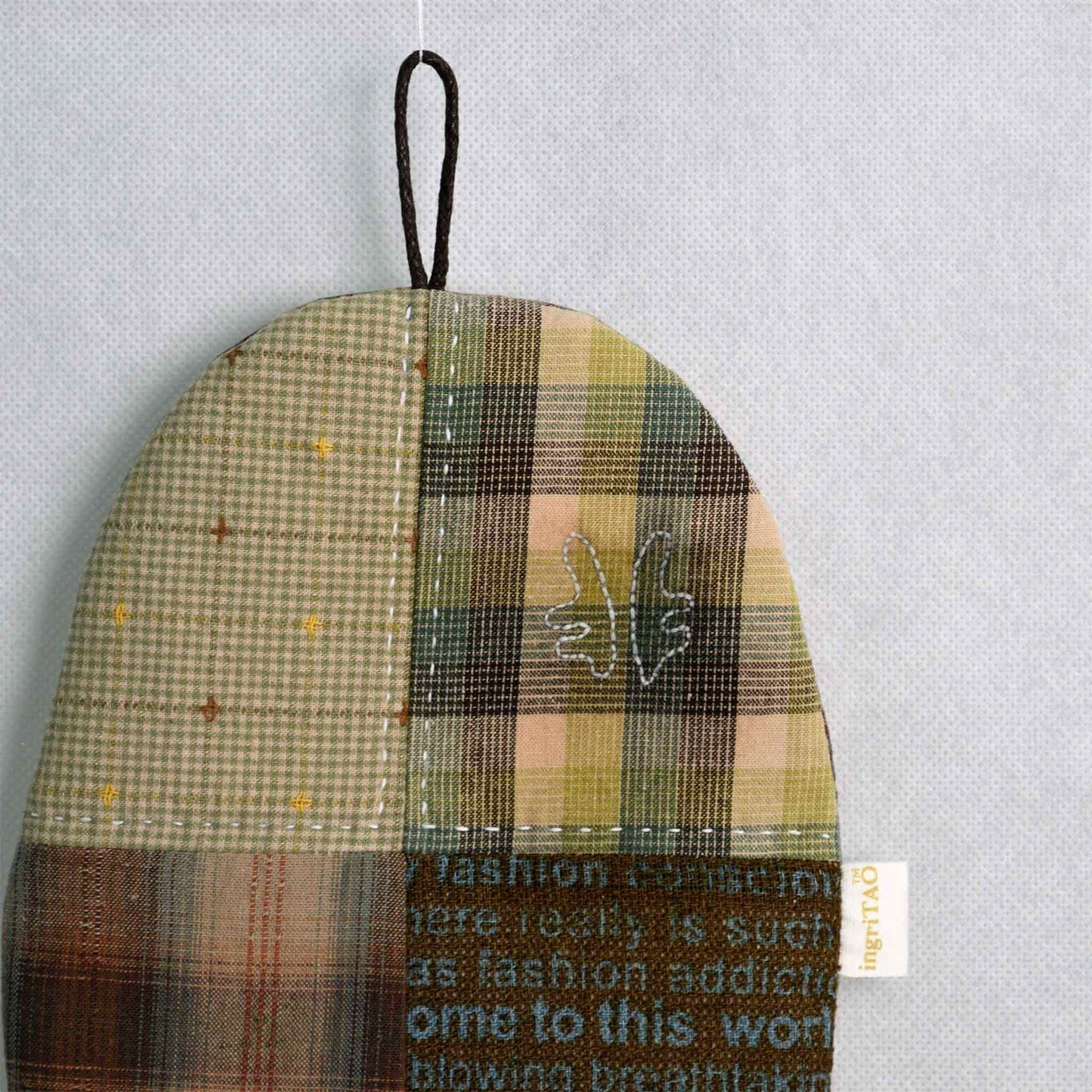 ingriTAO Ovoid Patchwork Pot Holder with Antlered hand - sewn stitches - ingriTAO