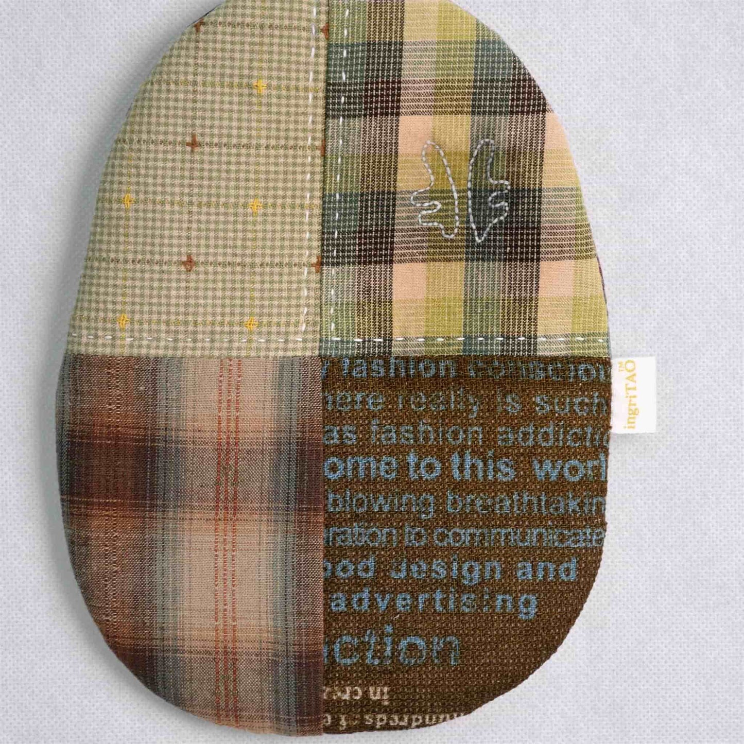 ingriTAO Ovoid Patchwork Pot Holder with Antlered hand - sewn stitches - ingriTAO